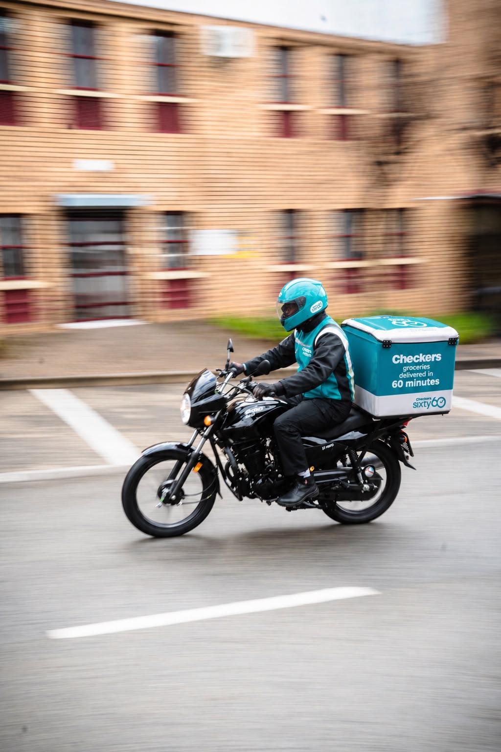 Checkers Sixty60 delivery rider on a Hero motorcycle